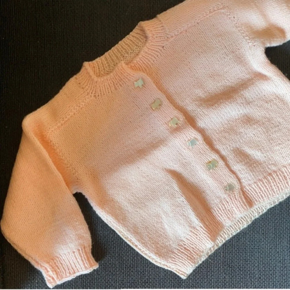 Pink hand knit sweater with dog buttons​ - Picture 7 of 14